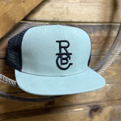 Raised By Coyotes Logo Trucker Cap-Sage